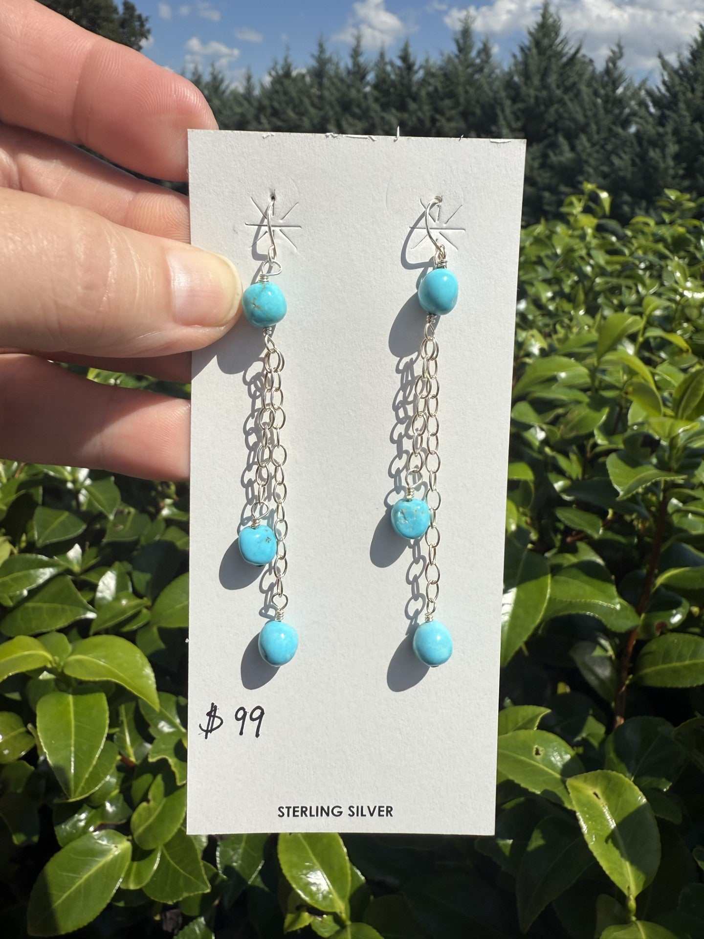 Sterling silver chain dangle earrings with Kingman turquoise balls, 3 inches long, handcrafted by Navajo artist.