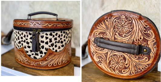 Leopard animal print jewelry box with tooled leather top and tassel.
