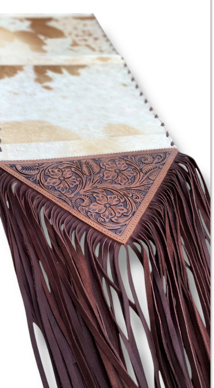 6ft cowhide leather table runner with unique patterns and fringed edges.