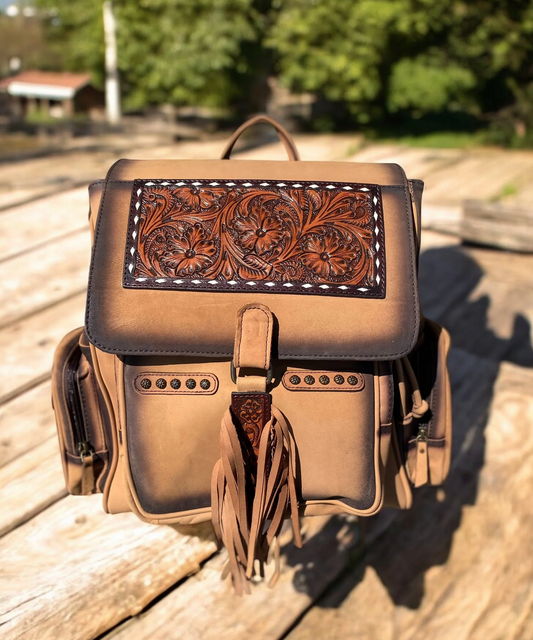 Burn & Tooled Leather Fringe Backpack with intricate tooling and stylish fringe detailing.