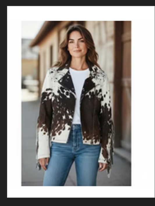 Brown cowhide jacket with fringe in size 2XL worn with jeans