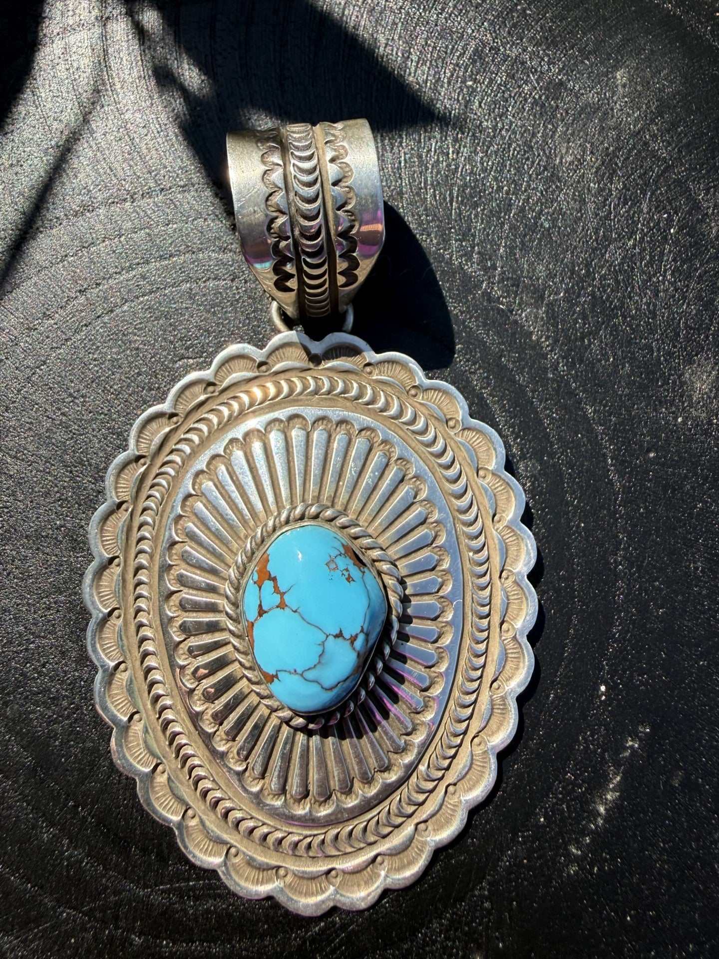 Native American Eqyptian Turquoise Pendant by Arnold Blackgoat with vibrant blue stone, 3.5 inches long and 2 inches wide