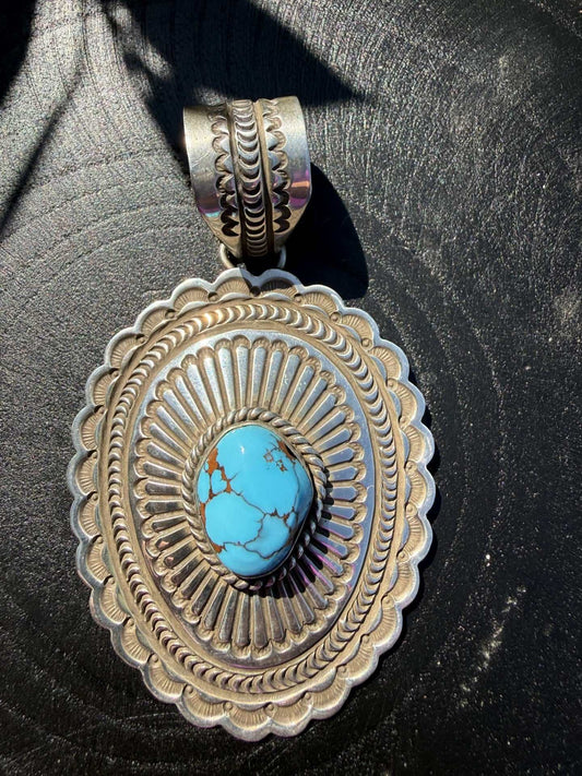 Native American Eqyptian Turquoise Pendant by Arnold Blackgoat with vibrant blue stone, 3.5 inches long and 2 inches wide