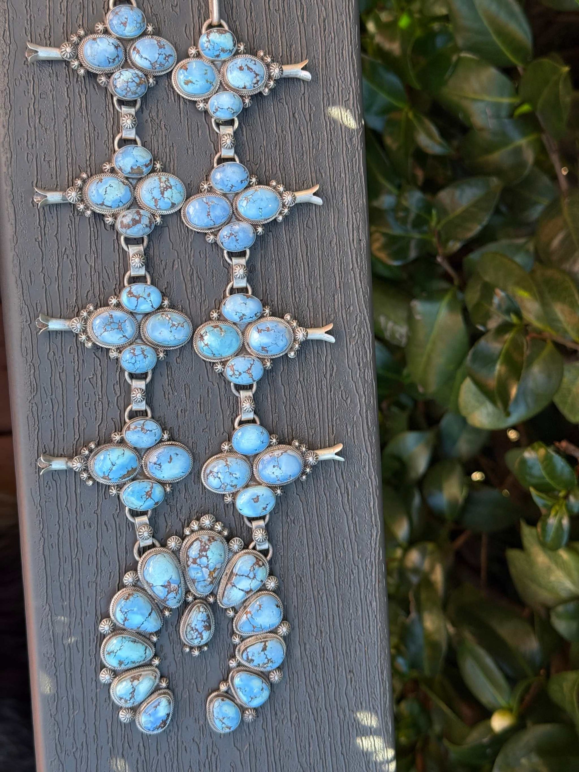 Golden Hills Squash Blossom necklace with turquoise stones and silver detailing, statement jewelry piece