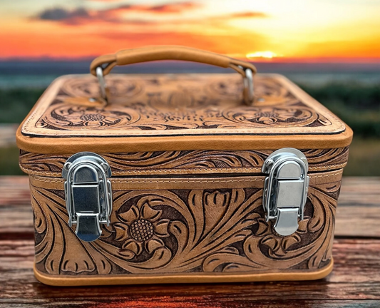 Hand tooled jewelry box with intricate patterns, travel organizer design, and metal clasps.
