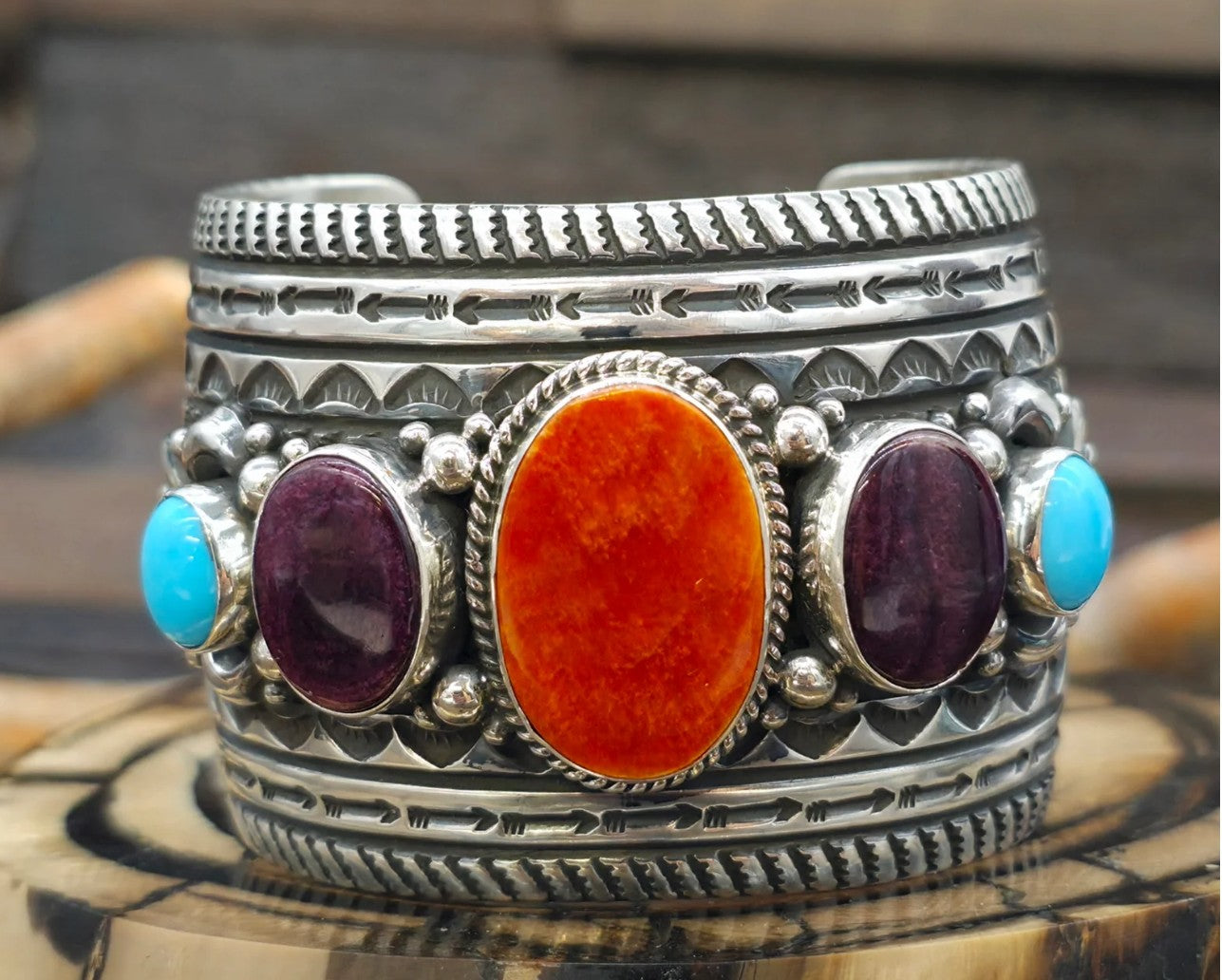Native American Spiny and Turquoise sterling silver cuff bracelet with bright orange and deep purple stones