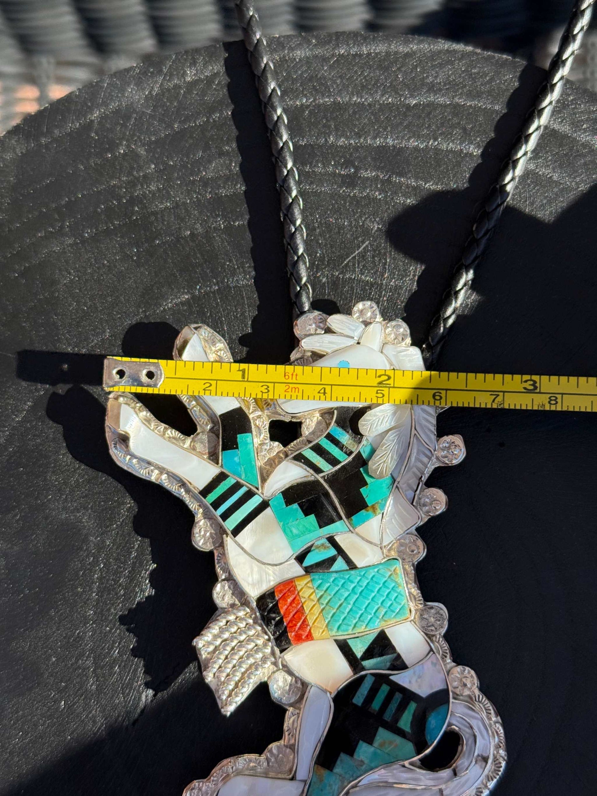 Eldred Martinez Horse Bolo with multi stone inlay and braided leather cords, Navajo made.