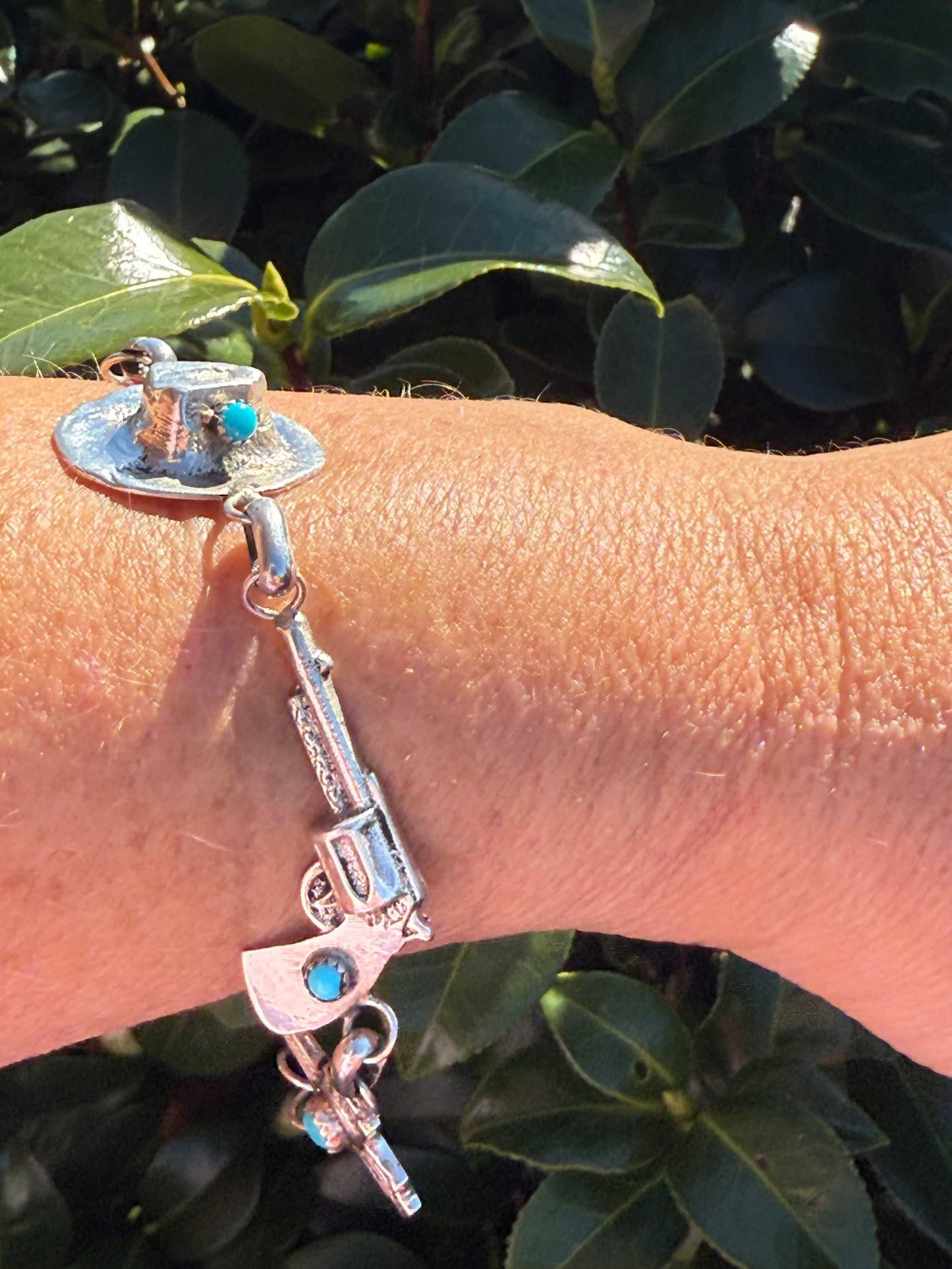 Robby Manuelito Bracelet with sterling silver Western charms and Sleeping Beauty Turquoise
