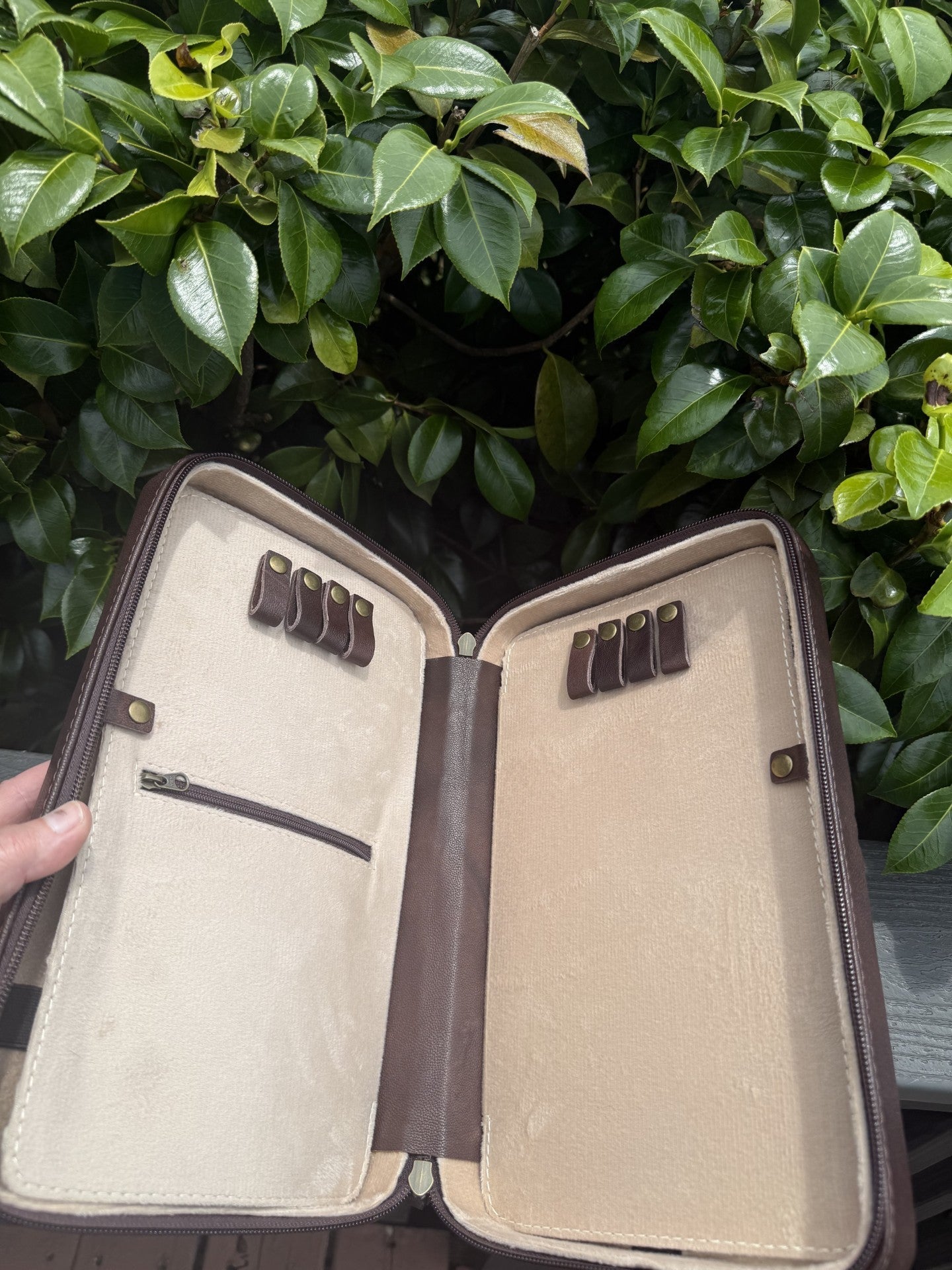 Tooled leather necklace case travel-storage book with three sections for necklaces and pendants