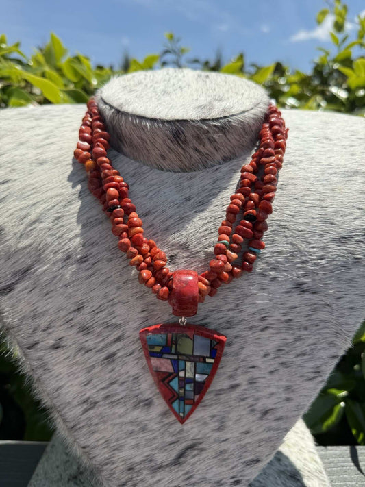 Chris Nieto Santo Domingo Pueblo Inlay pendant with multi-strand apple coral necklace handcrafted Native American jewelry