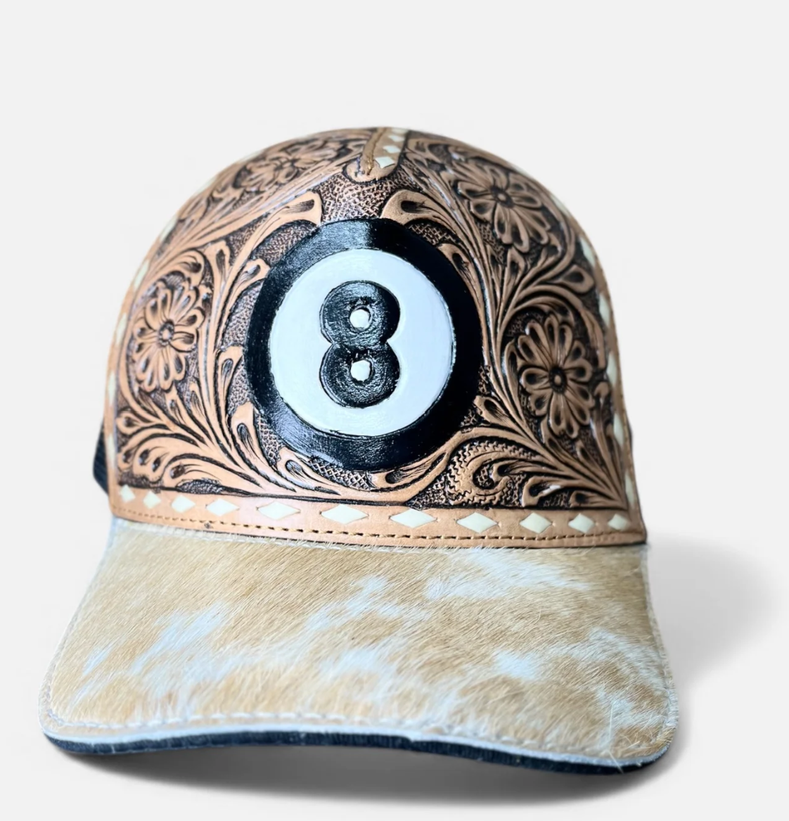 8 ball tooled leather cap showcasing detailed craftsmanship and style
