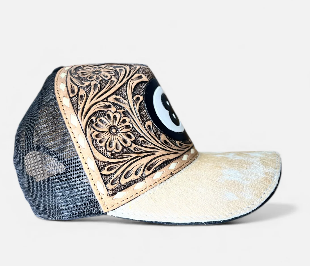 8 ball tooled leather cap with intricate craftsmanship and stylish design