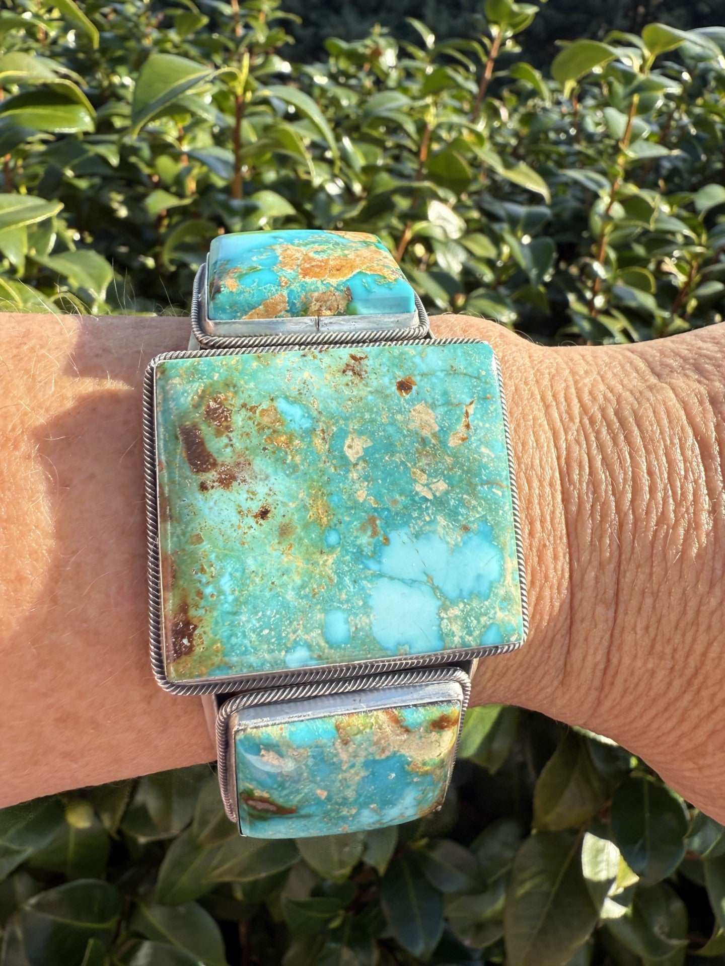 Sonoran Gold Turquoise cuff bracelet with large natural turquoise stones set in intricate silver by Navajo artist.