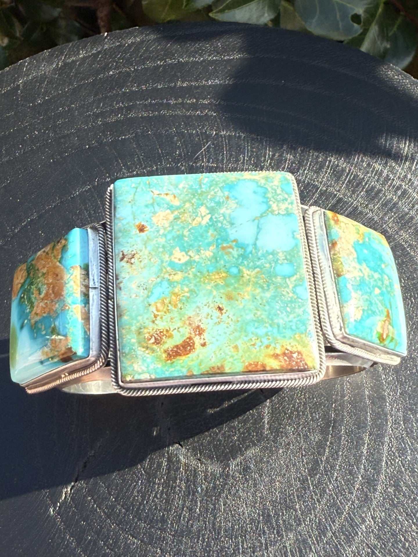 Sonoran Gold Turquoise cuff-bracelet with large turquoise stones and silver detailing by Navajo artist Freddie Maloney