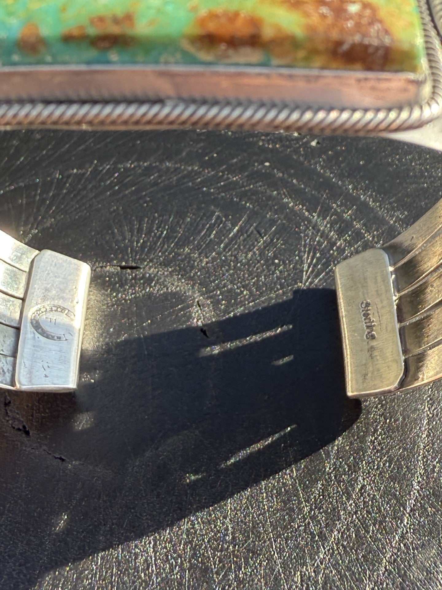 Sonoran Gold Turquoise cuff-bracelet with silver detailing by Navajo artist Freddie Maloney providing a unique Native American art piece