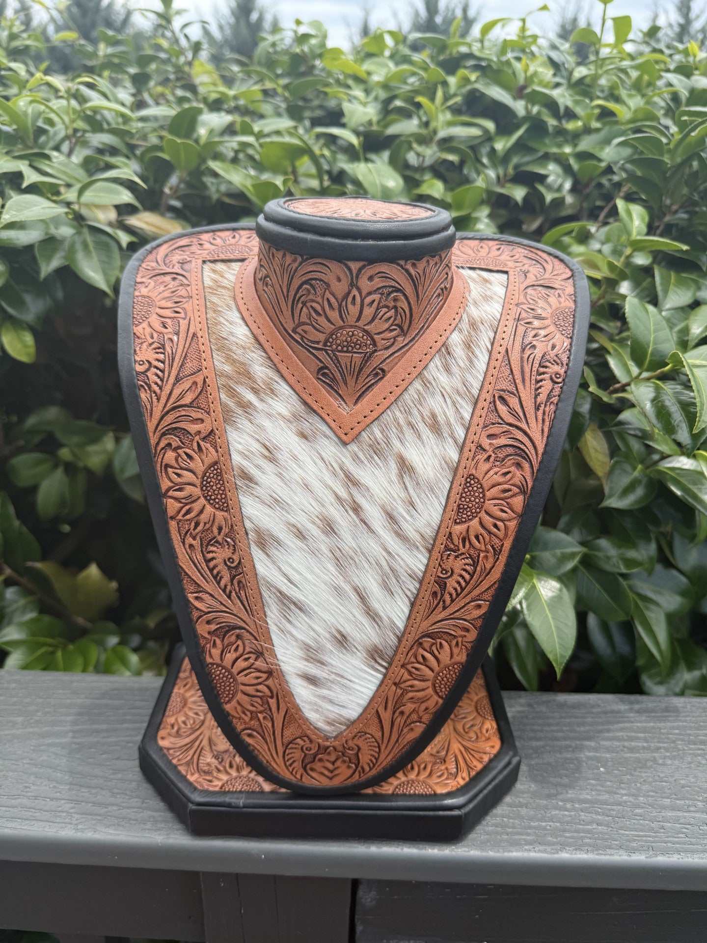 Medium Tan Brown tooled Leather and brown white cowhide necklace display for stylish jewelry organization
