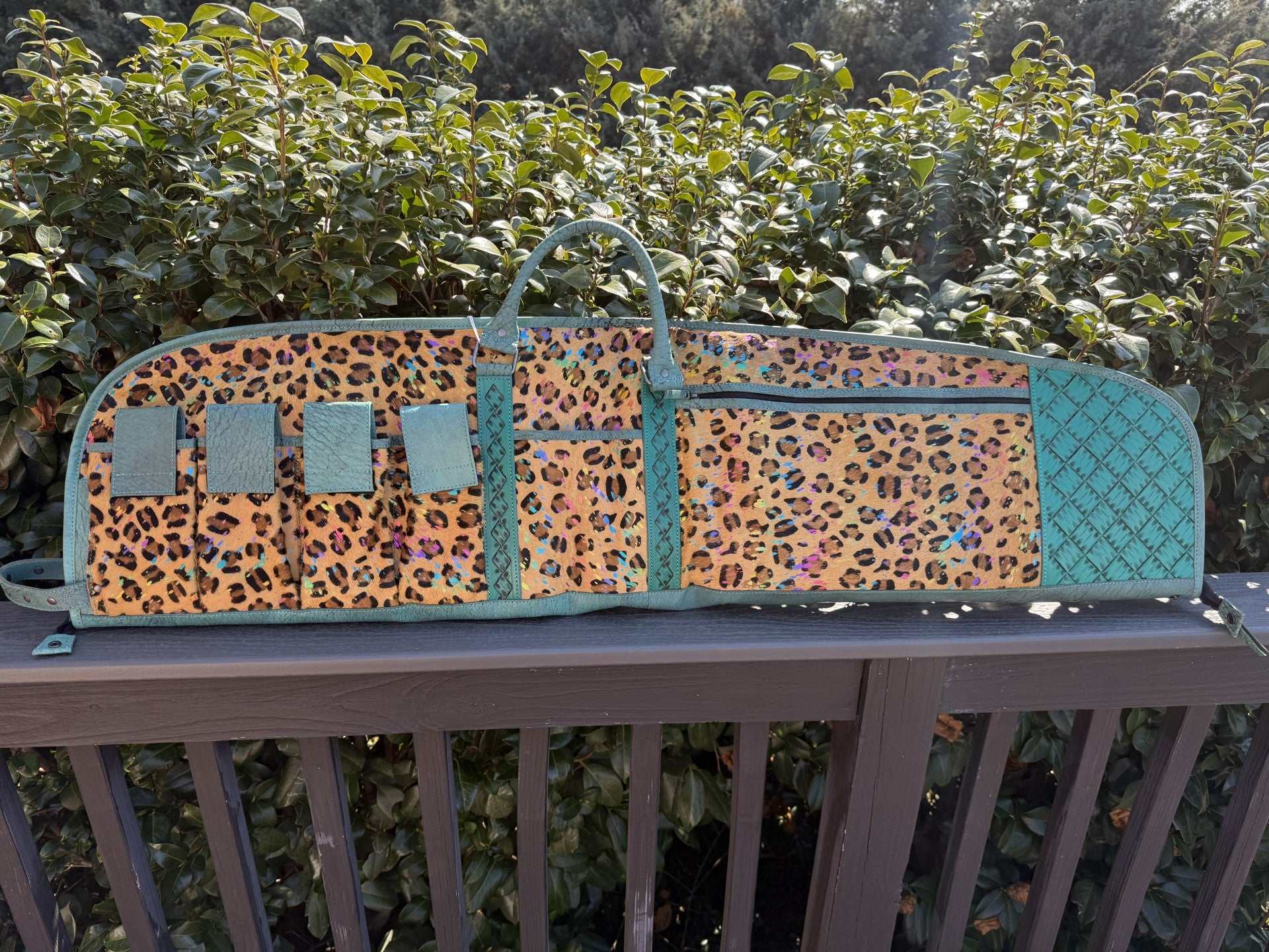 Tooled and cheetah print hide leather rifle case with patchwork design and magazine compartments