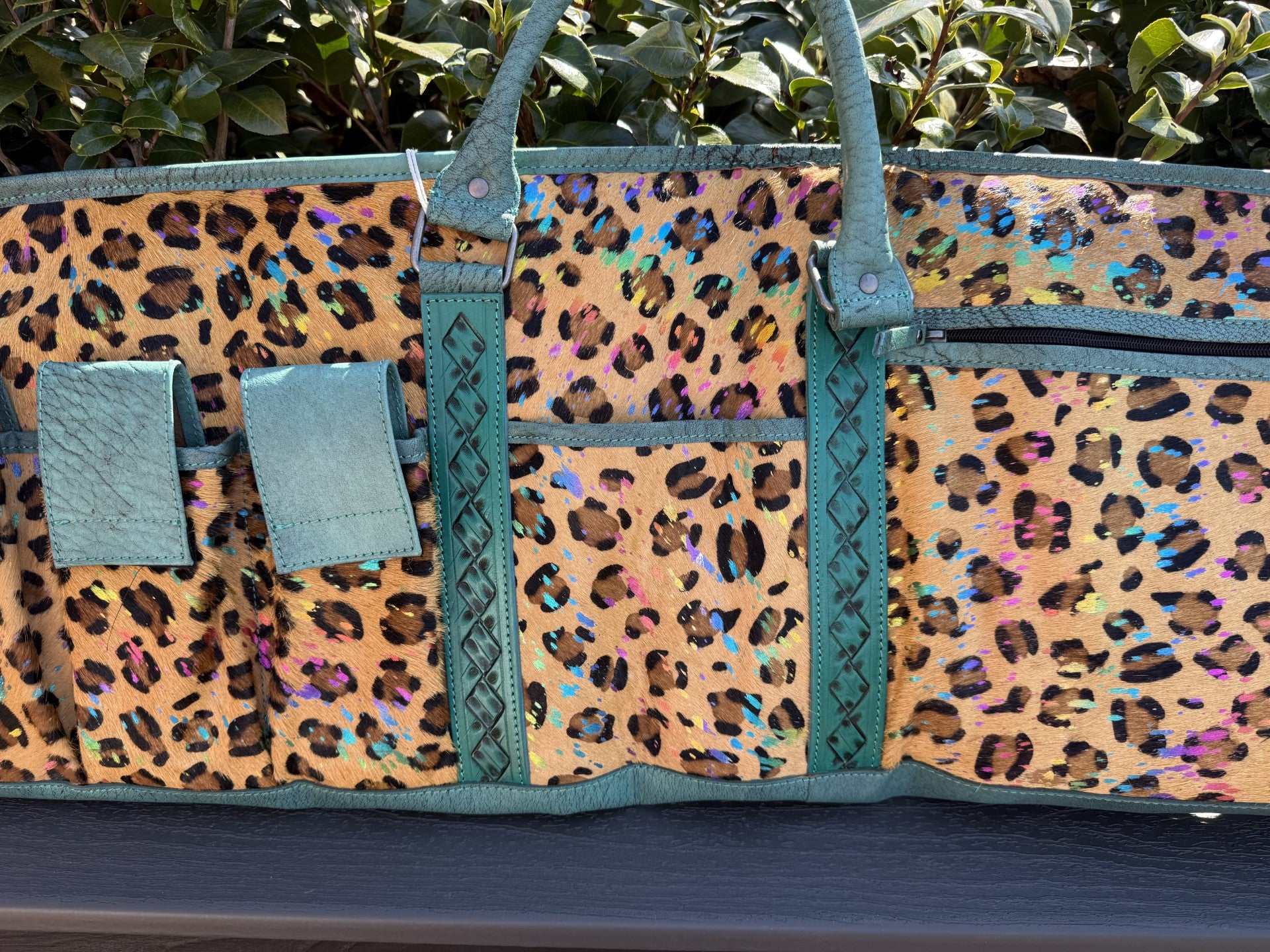 Tooled and cheetah print hide leather rifle case with patchwork design and magazine compartment