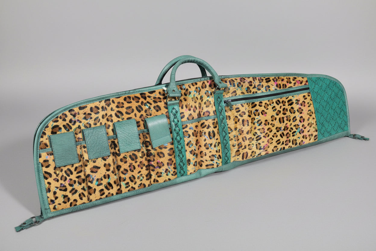 Tooled and cheetah print leather rifle case with patchwork design and magazine compartment