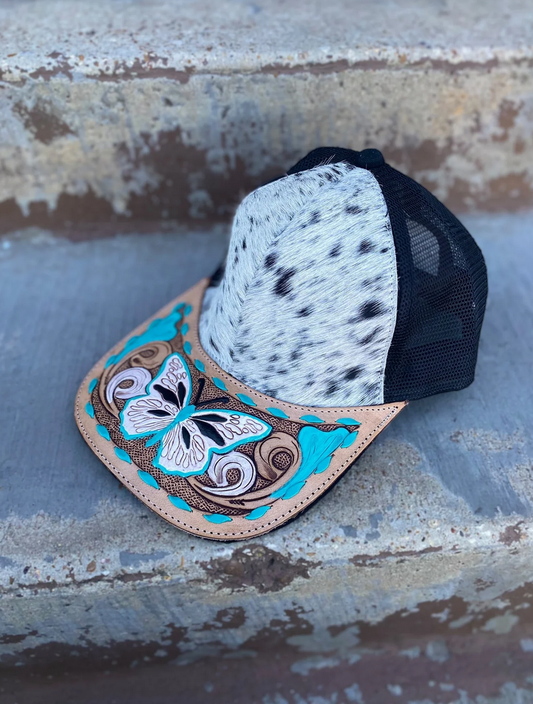Cowhide tooled leather cap with turquoise butterfly design and adjustable black mesh back