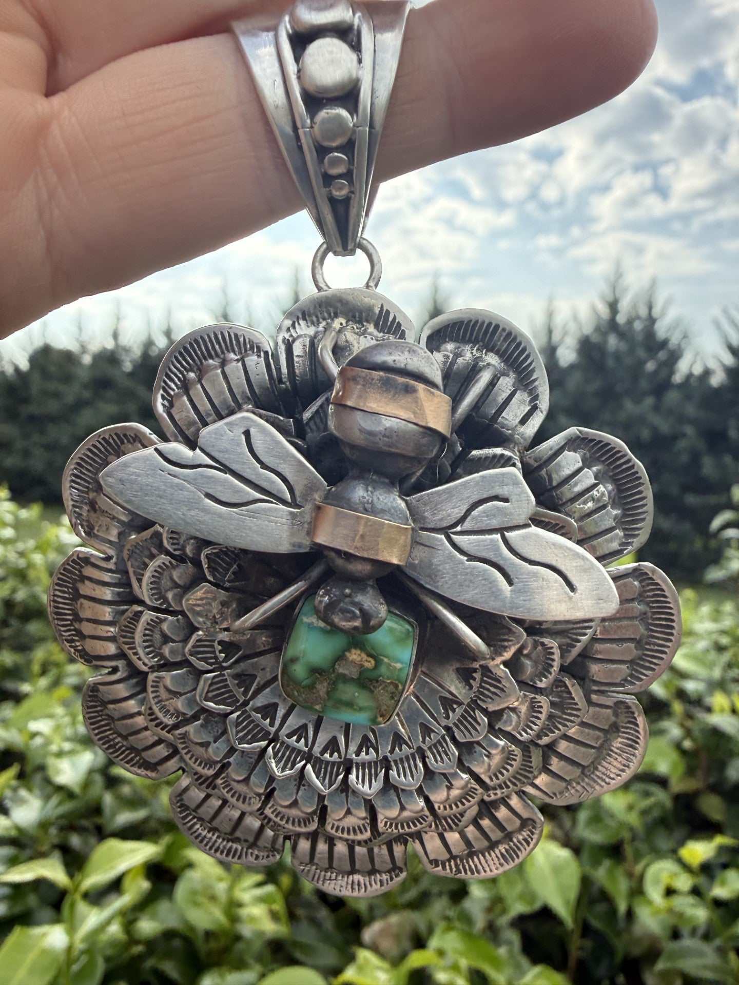 Bee pendant with sterling silver, brass, and Sonoran gold turquoise by Navajo silversmith Russell Sam