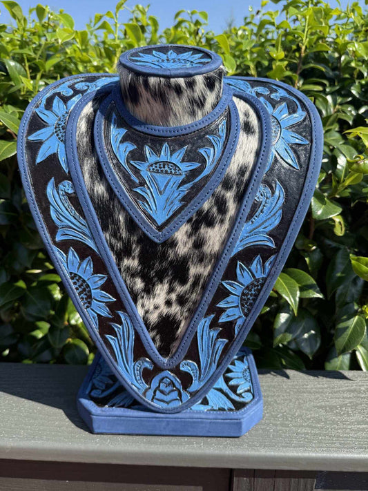 Blue hand tooled leather and cowhide necklace display stand
