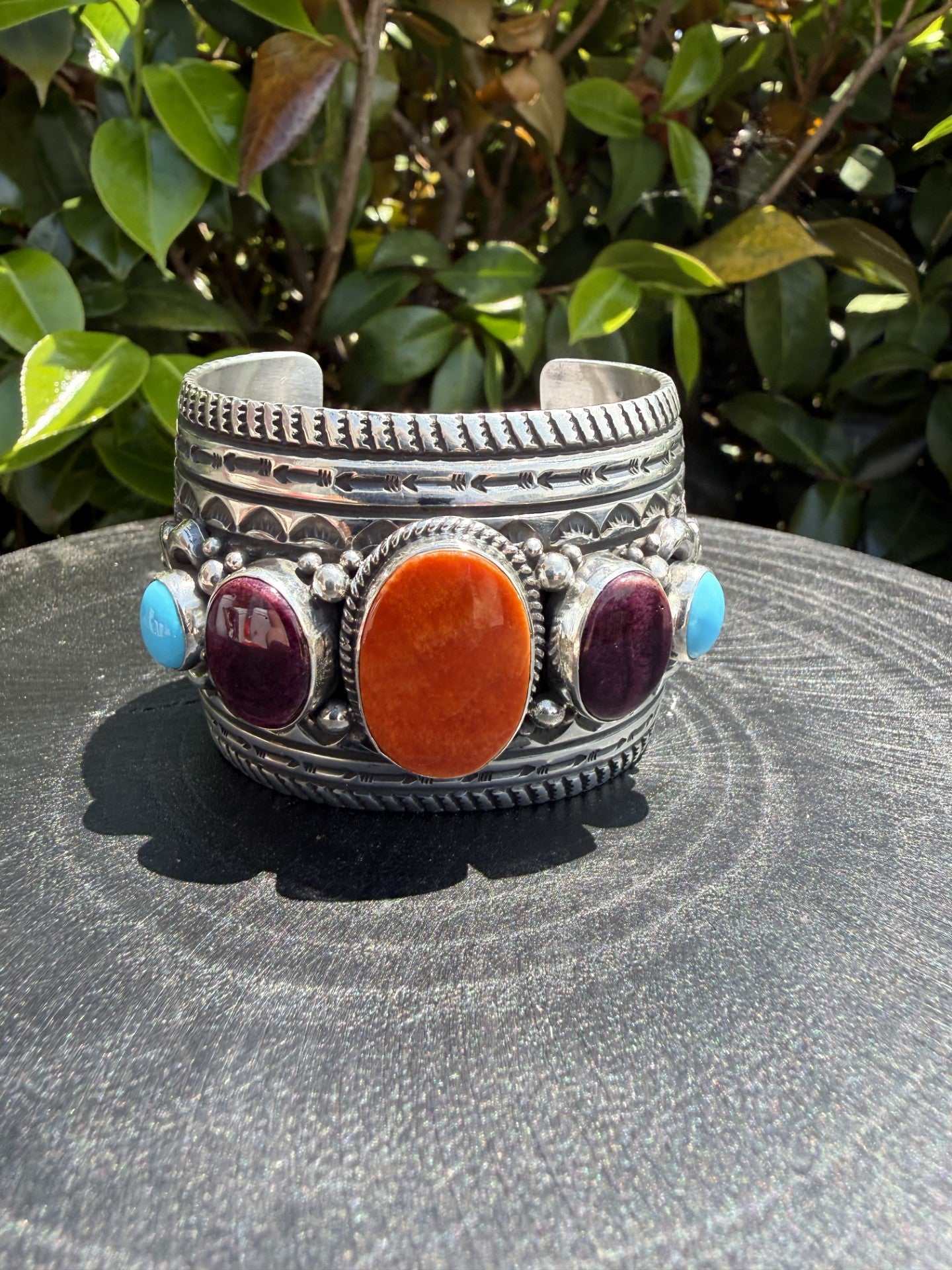 Native American Spiny and Turquoise sterling silver cuff bracelet with bright orange and deep purple stones