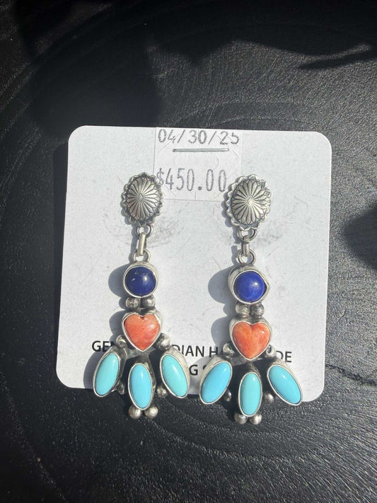 Multi stone dangle earring with silver stamped concho tops, blue lapis, orange spiny coral heart and turquoise stones in a dangle style