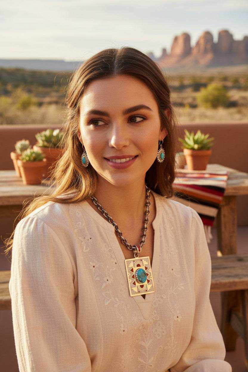 Native American pendant by Navajo artist Michael Perry with Kingman webbed and coral inlay