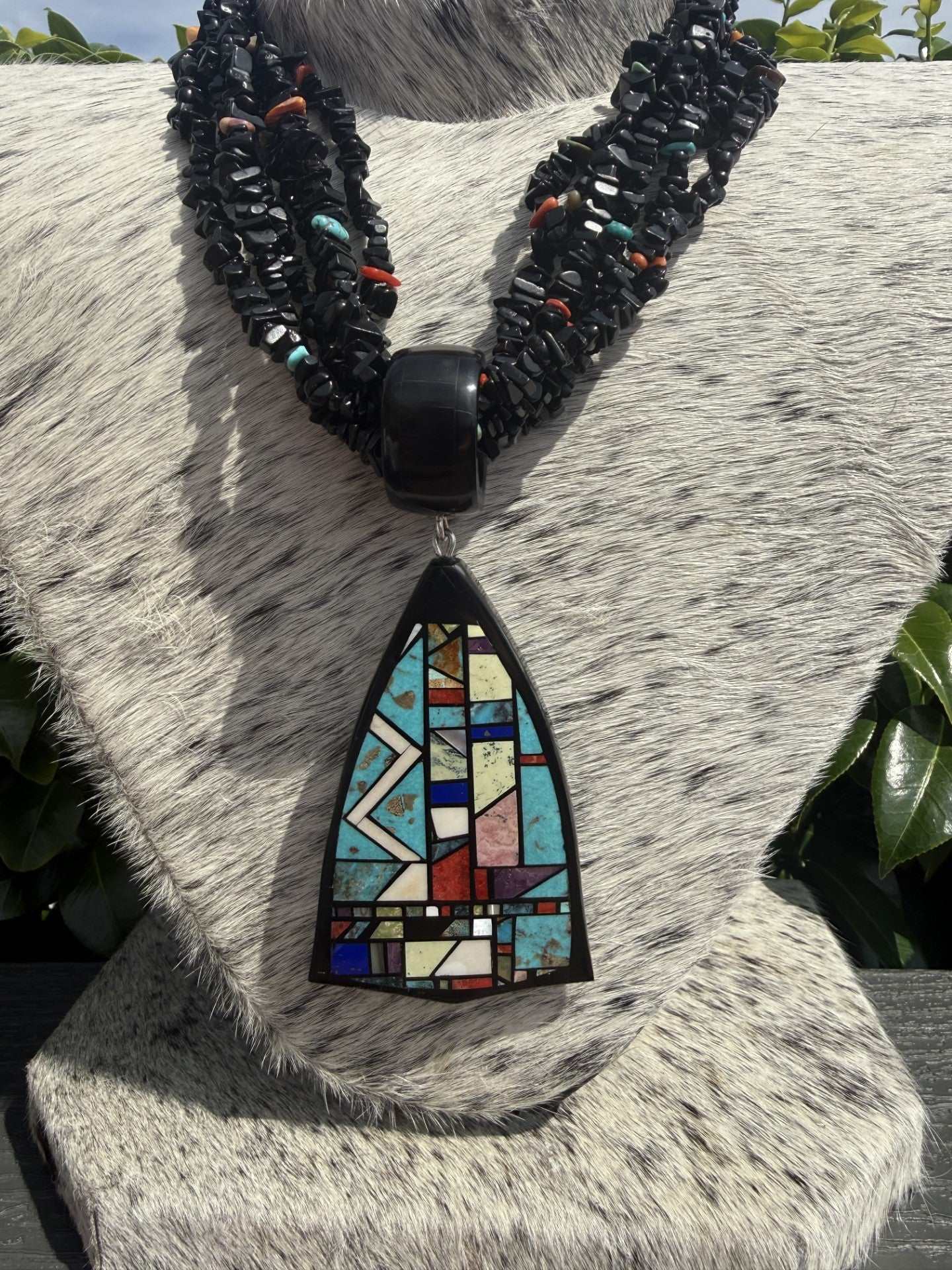Six Strand Black Jet Necklace with multistone inlay pendant by Chris Nieto featuring turquoise, coral, and spiny stones