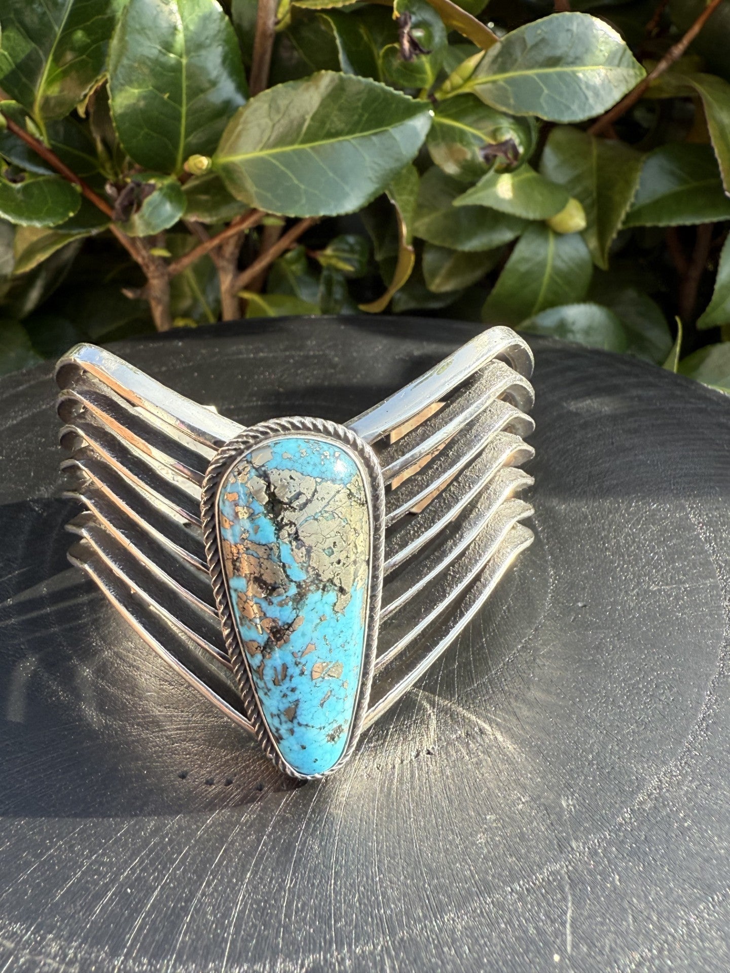 Persian turquoise bracelet-cuff with pyrite in turquoise by Aaron Anderson on silver cuff