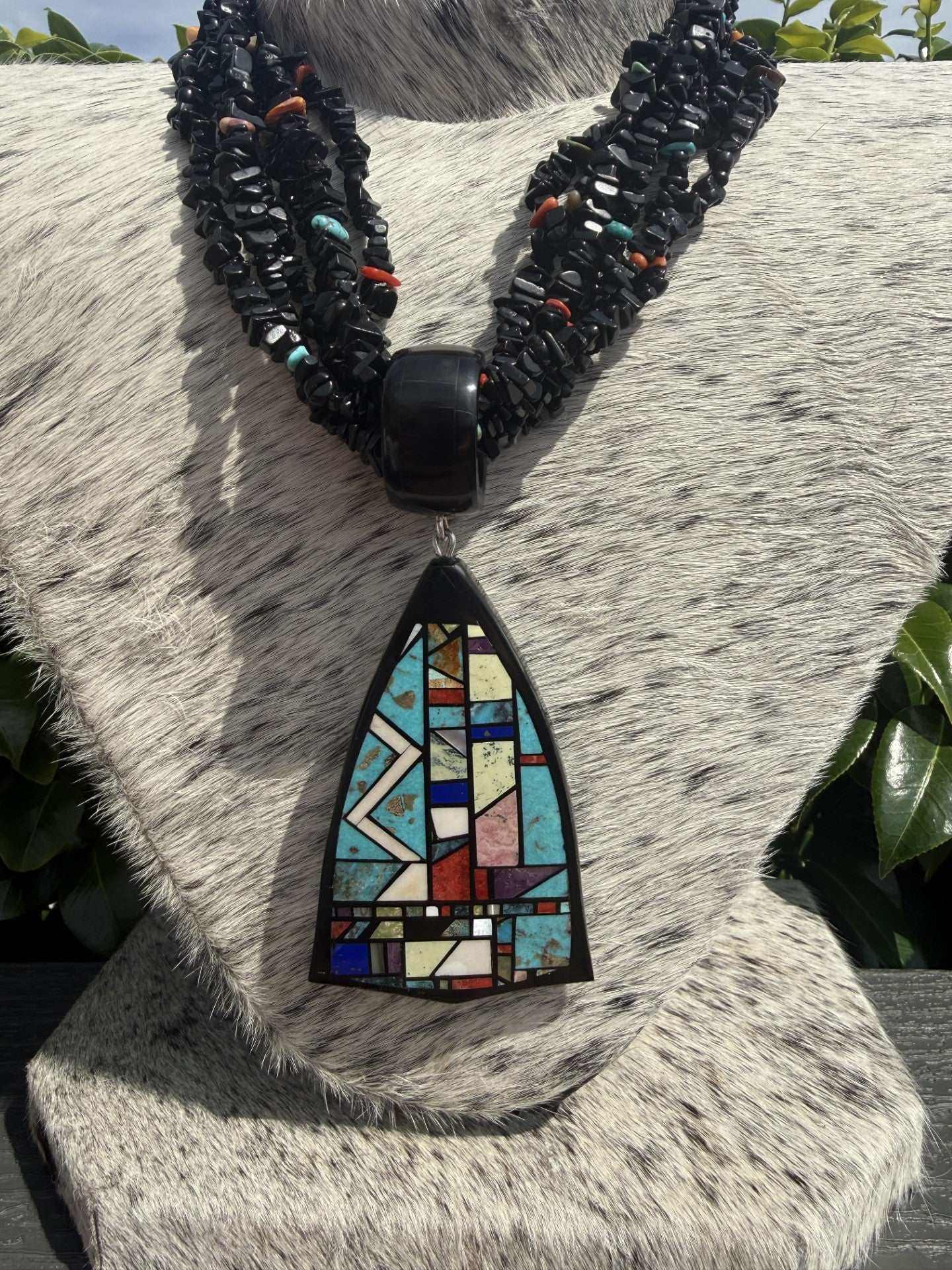 six strand black jet necklace with multistone inlay pendant by chris nieto