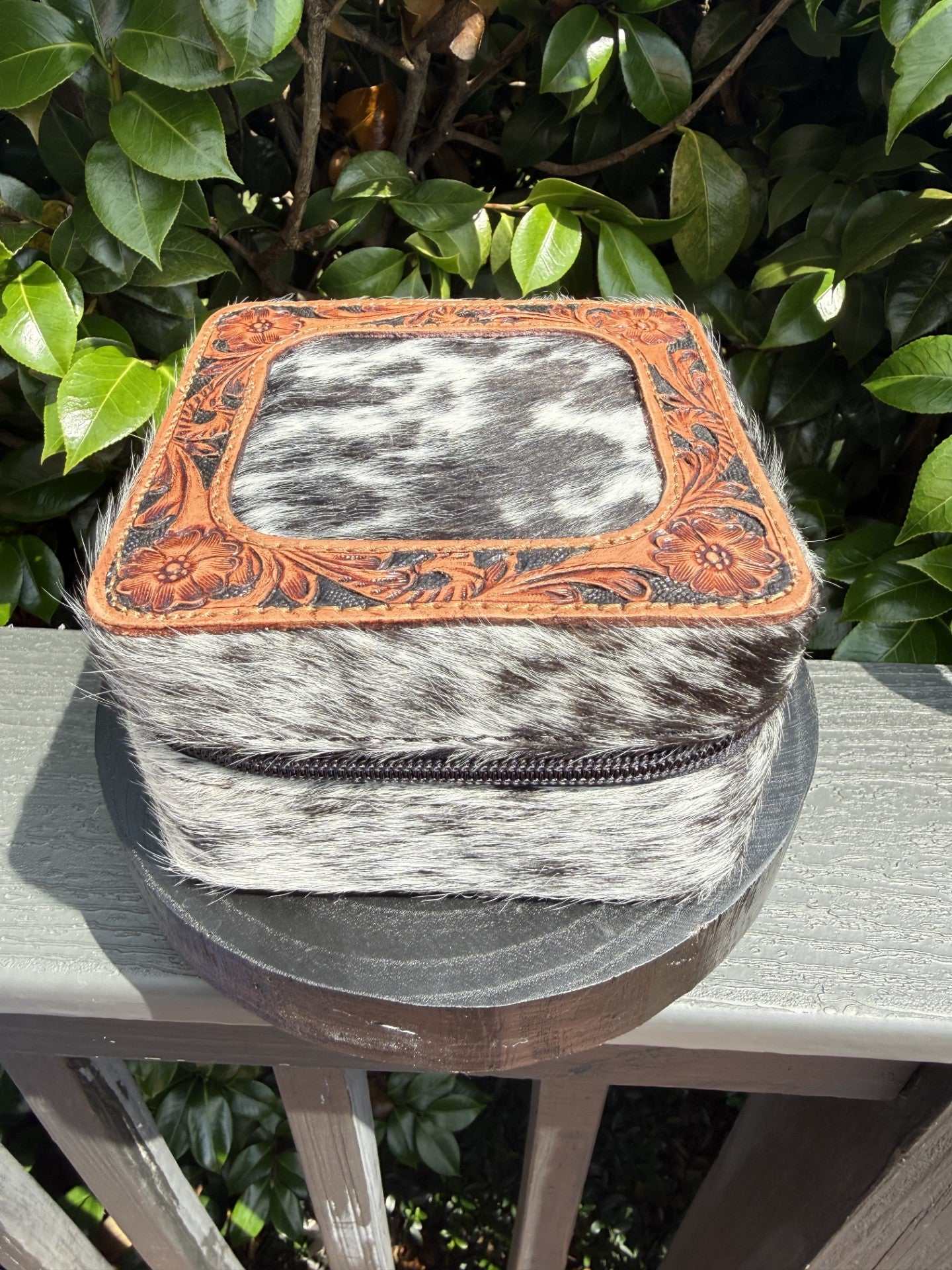 Cowhide and tooled travel jewelry box handmade stylish storage solution measuring 5.5x5.5x3.6 inches