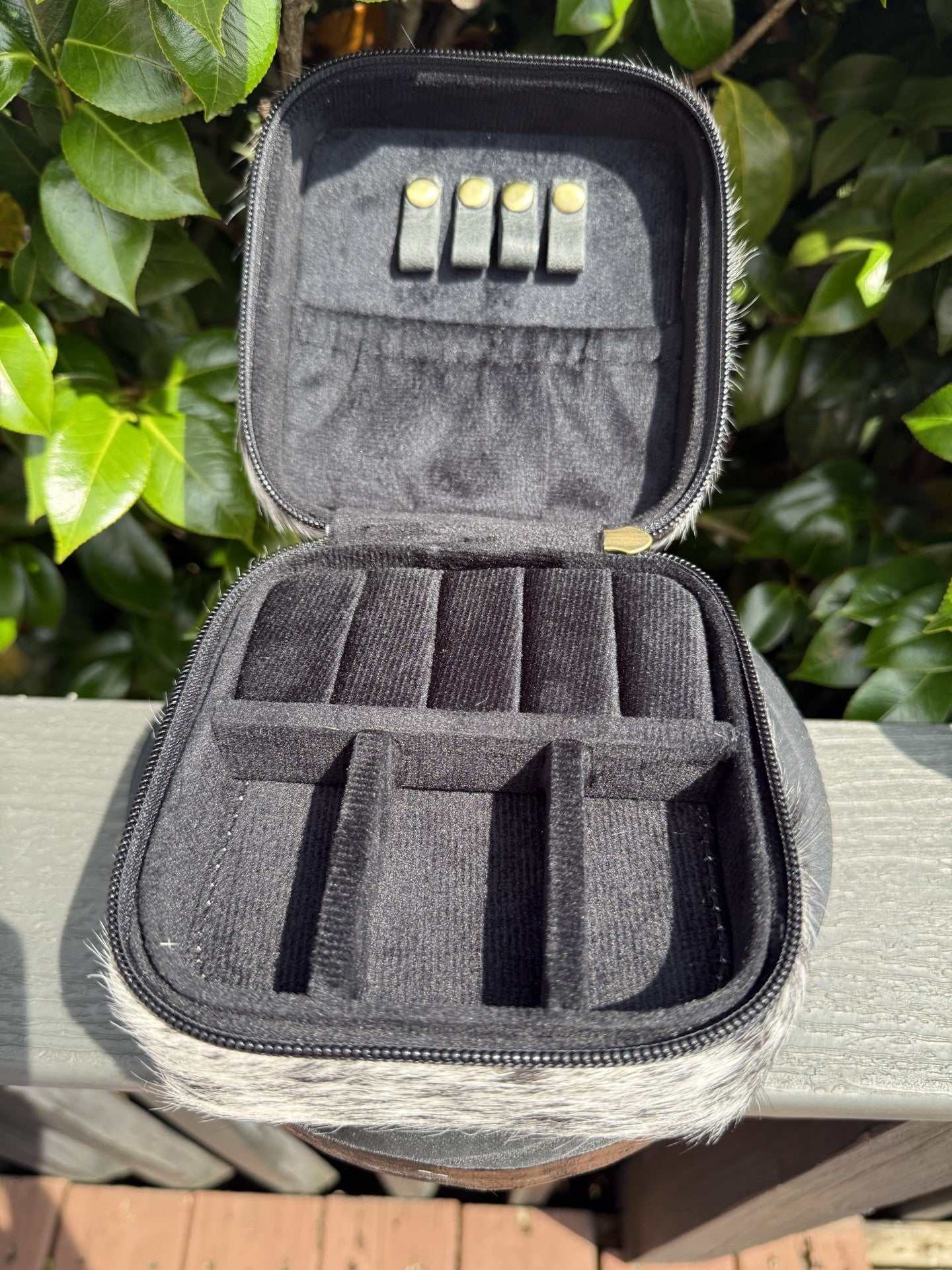 Handmade cowhide and tooled travel jewelry box measuring 5.5x5.5x3.6 inches, stylish and unique storage solution