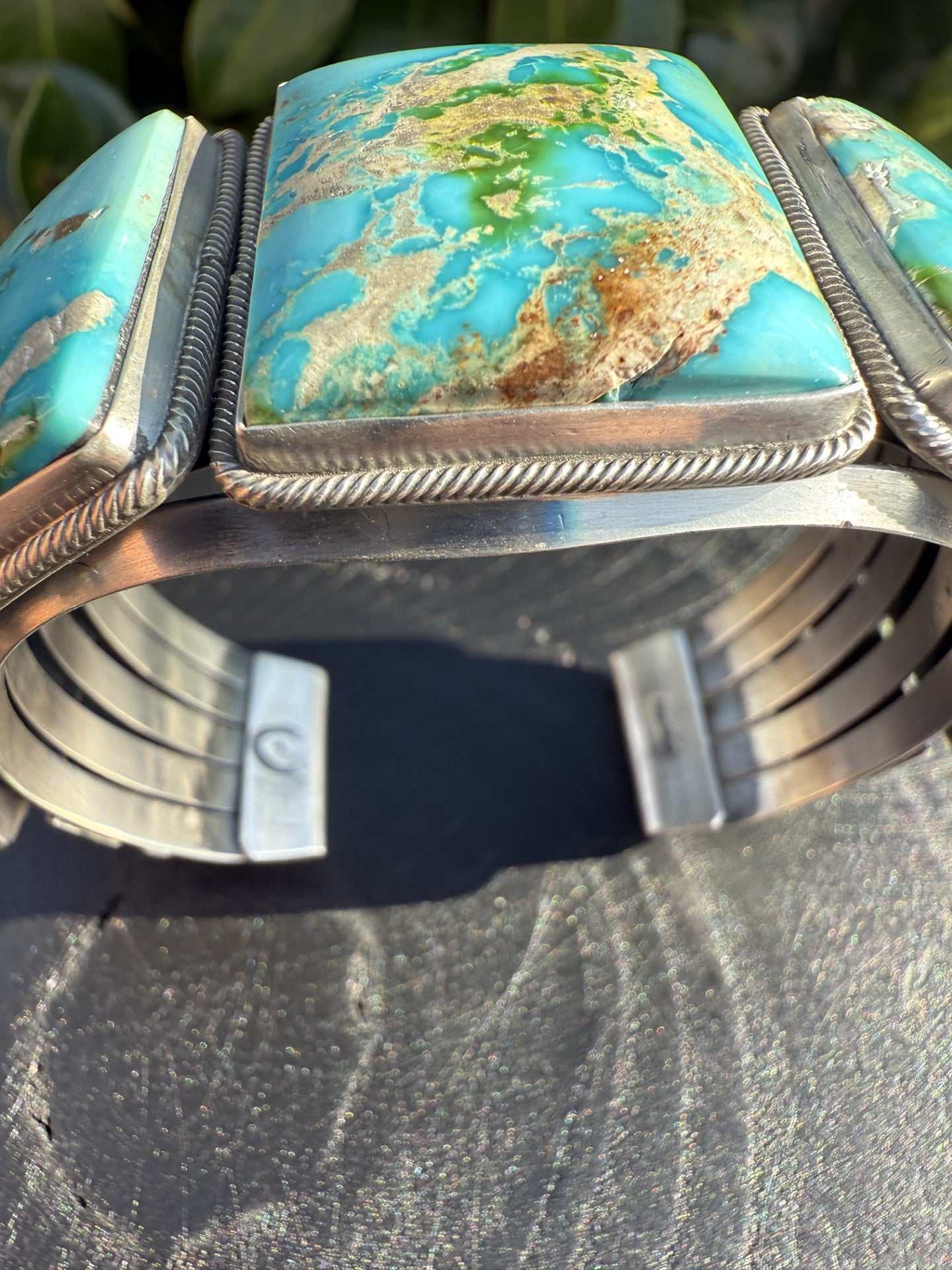 Stunning Sonoran Gold Turquoise cuff with sky-blue and earth-tone stones in silver setting