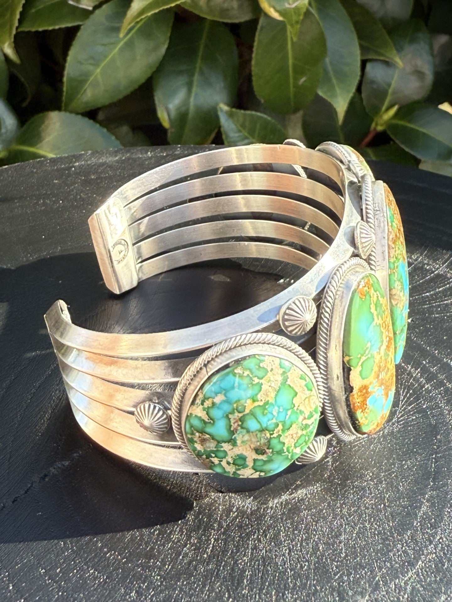 Gorgeous Sonoran Gold Turquoise Cuff with vibrant green and golden stones by Navajo artist Feddie Meloney